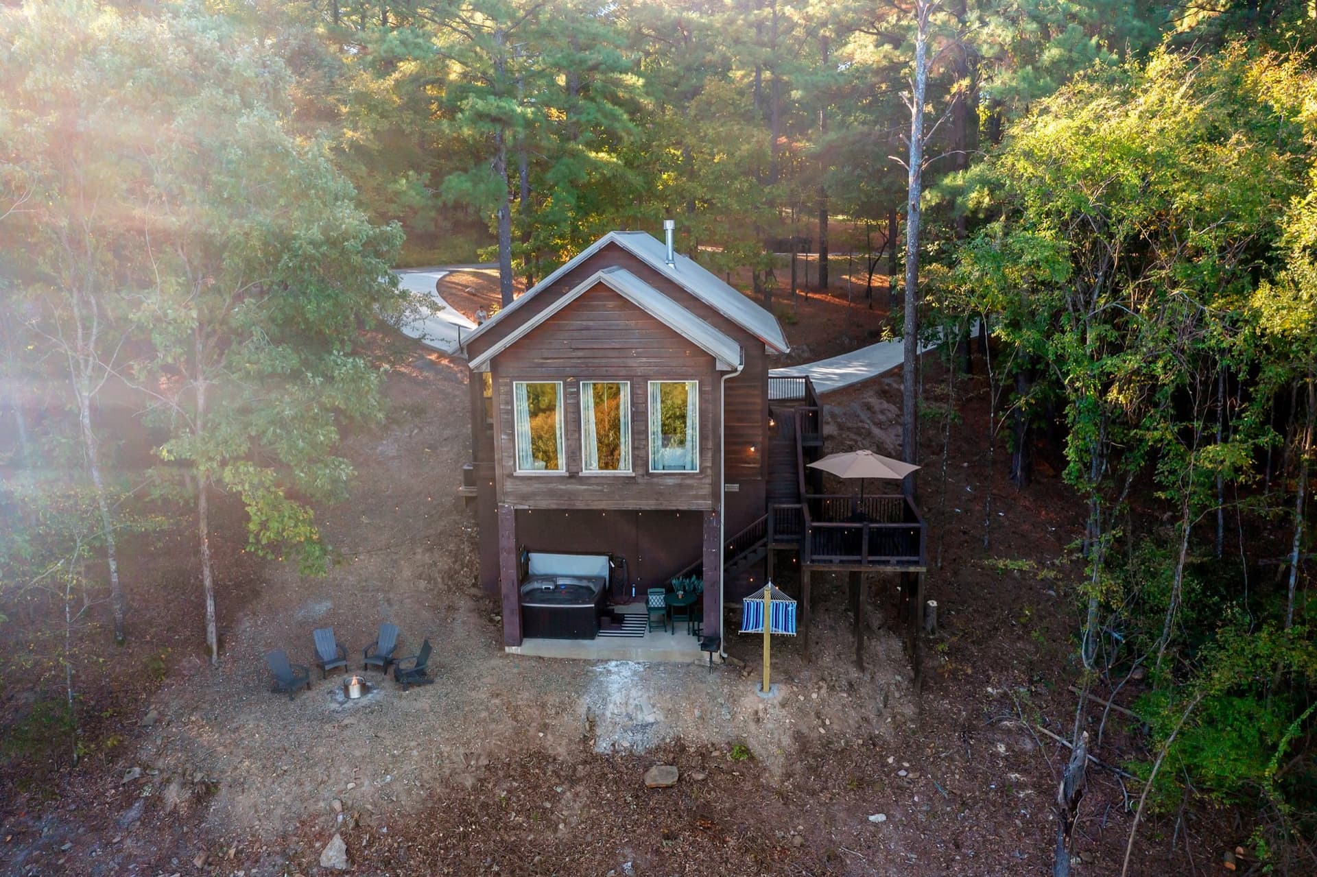 Aerial view of Mount Mirabelle, a luxury cabin with a private hot tub and fire pit in the Ouachita pines, Broken Bow, OK